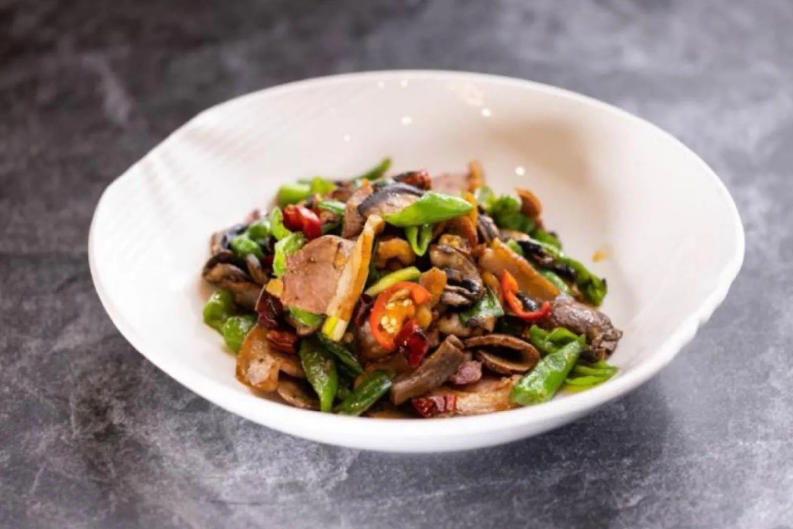 Stir-fried mushroom with green peppers & Yunnan-style ham at Ping's Bistro Rowland, a Chinese Restaurant in Hacienda Heights