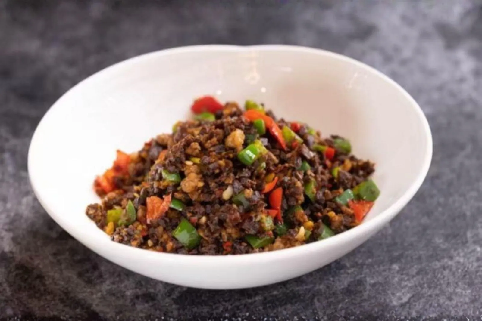 Stir-fried minced pork & chili with Yunnan pickles (rice companion) at Ping's Bistro Rowland, a Chinese Restaurant in Hacienda Heights